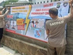 Pemasangan Spanduk Imbauan Bahaya Penipuan Dan Kejahatan Dunia Maya Oleh Unit Binmas Polsek Cempaka Putih