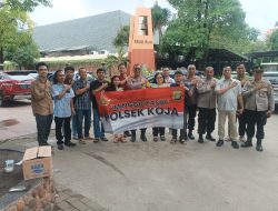 Polsek Koja Gelar Program Minggu Kasih di Gereja Salib Suci
